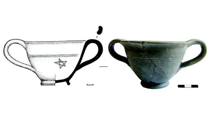 The grey-clay kantharos from Burial 52, with the scratched pentagram shown in the accompanying drawing