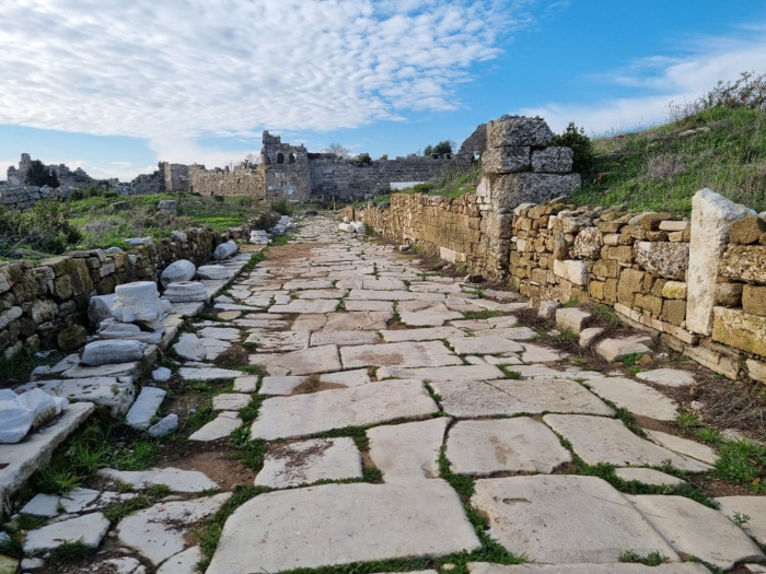 A surviving stone-paved street among the ruins of ancient Side.